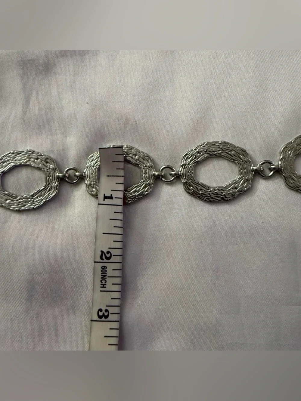 Silver tone metallic skinny chain belt